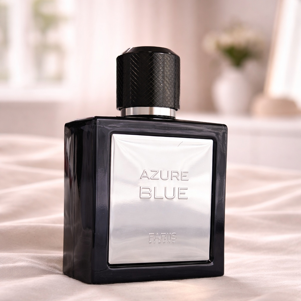Perfume bottle labeled 'Azure Blue' on a light fabric background