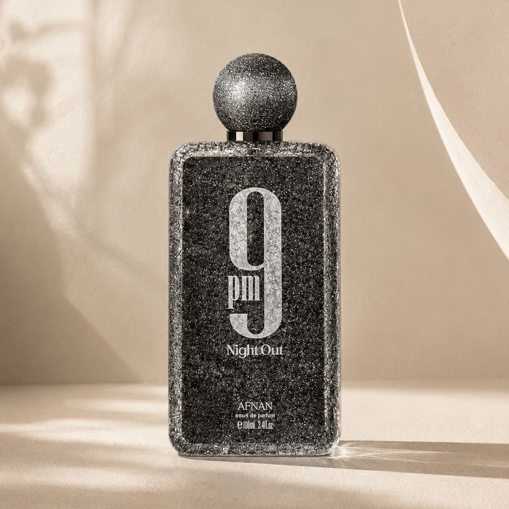 Perfume bottle labeled '9 Night Out' on a beige background