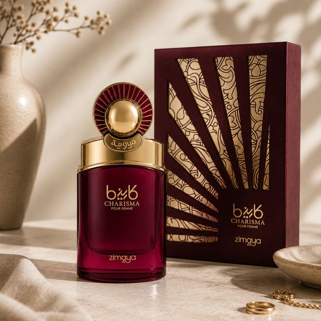Bvlgari Charisma perfume bottle and packaging on a decorative surface with a vase and jewelry.
